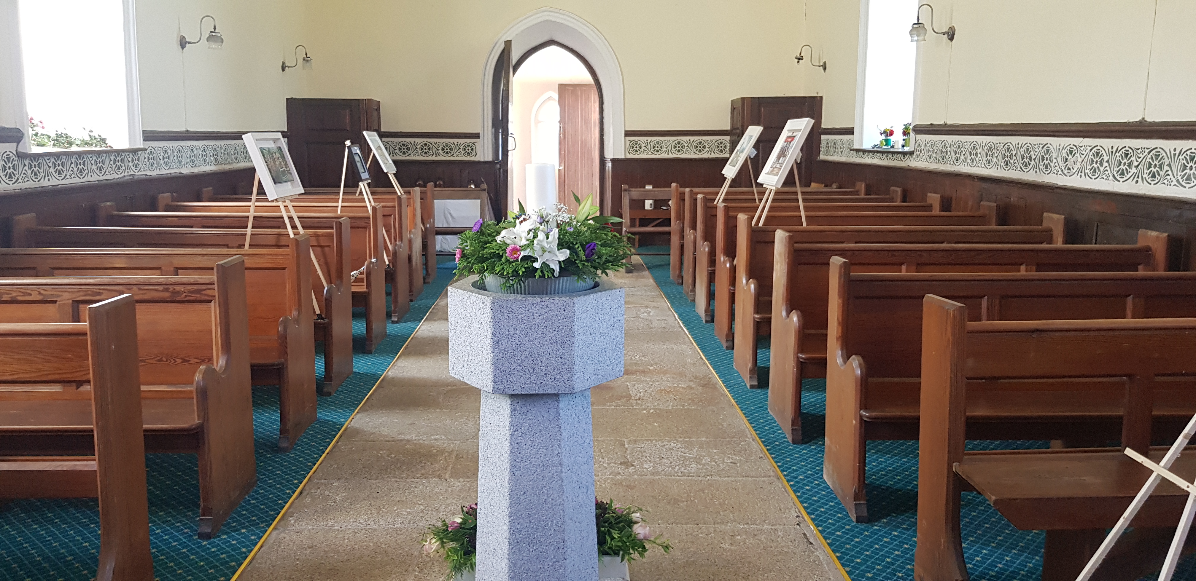 Setting up for an art exhibition in the Church